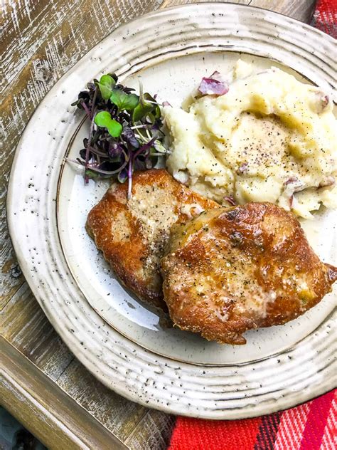 Season Pork Chops with steak seasoning and place down in a 6-8 quart electric pressure cooker. . Boneless pork chops in pressure cooker